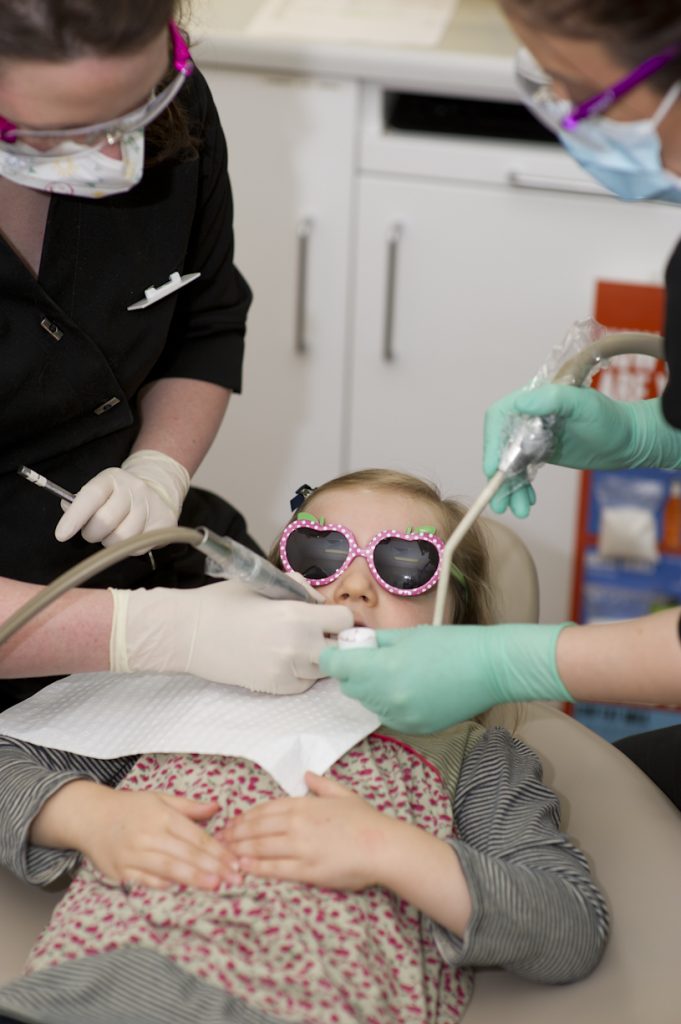 Girl visiting the dentist